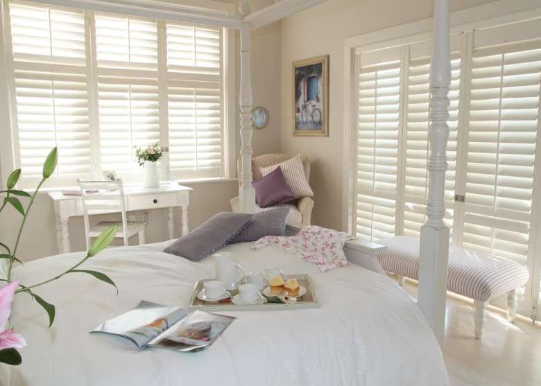 Full height bedroom shutters